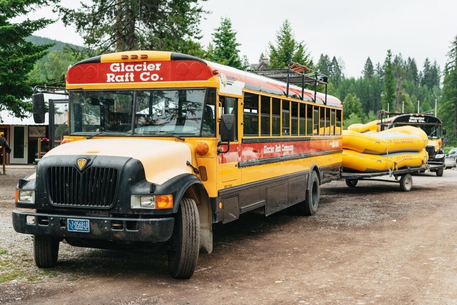 West Glacier: Glacier National Park Scenic Raft Trip - The short bus ride to the river
